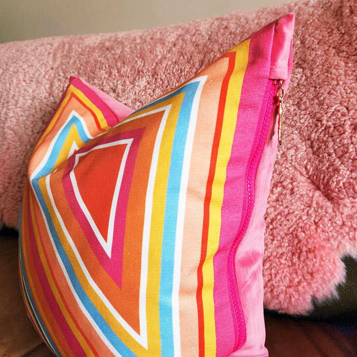 By John Designs colourful bright multi geometric pattern scatter cushion with velvet