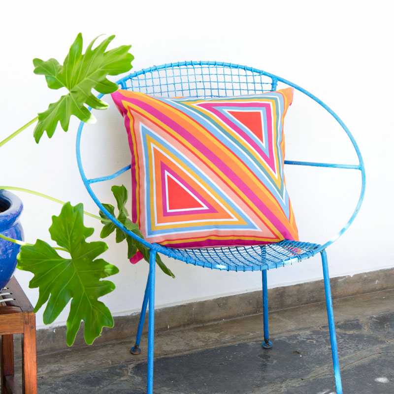 By John Designs colourful bright multi geometric pattern scatter cushion with velvet